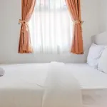 Warm And Cozy 2Br Green Pramuka Apartment Near Mall By Travelio